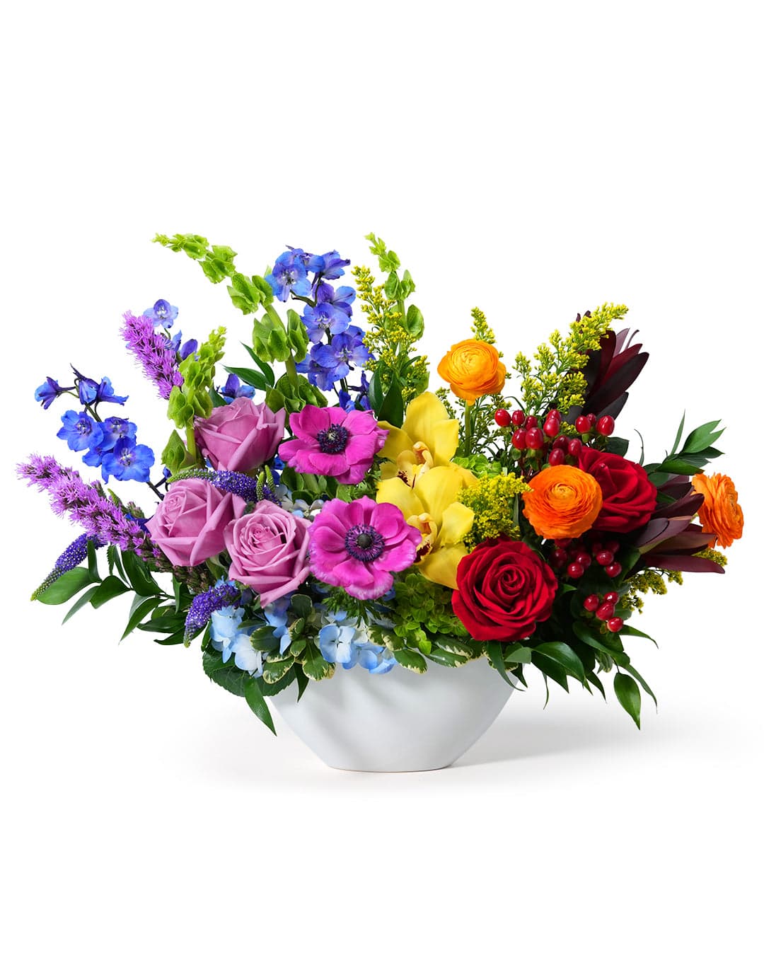 Vibrant floral arrangement featuring roses, lilies, and seasonal blooms in a white vase for brightening any space.