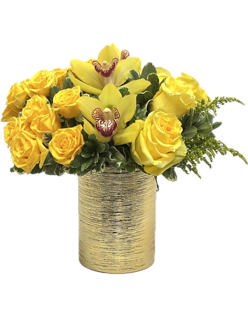 Bright yellow roses and elegant orchids arranged in a stylish gold vase for a cheerful floral display.