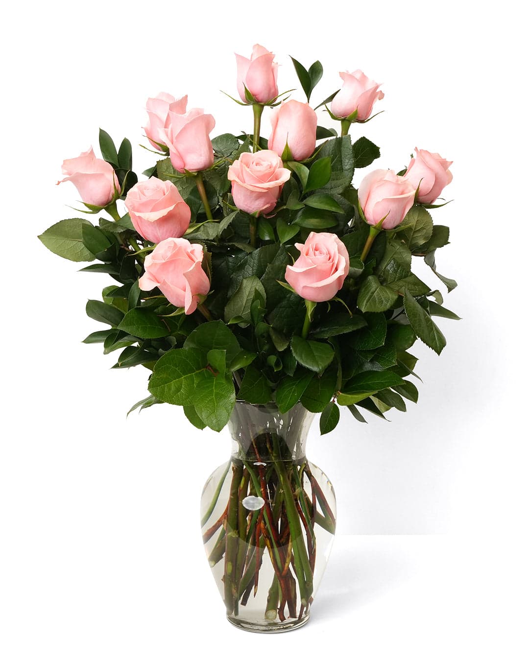 A beautiful bouquet of 12 pink roses arranged in a clear glass vase, perfect for any occasion.