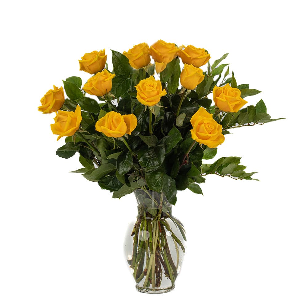 A vibrant bouquet of 12 yellow roses elegantly arranged in a clear glass vase, perfect for any occasion.